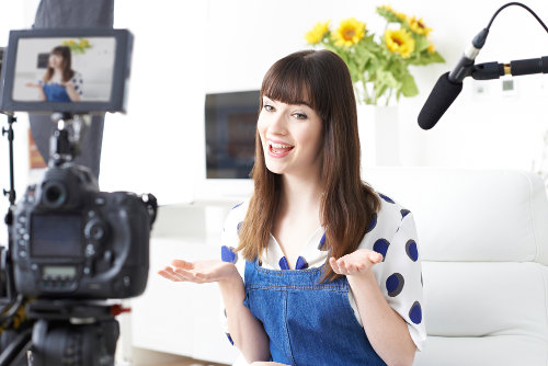 Vlogger creates a marketing video
