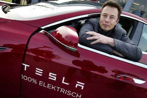 Elon Musk in a Tesla