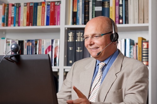 An Executive using VoIP
