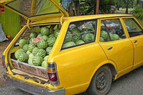 Car loaded with watermelons