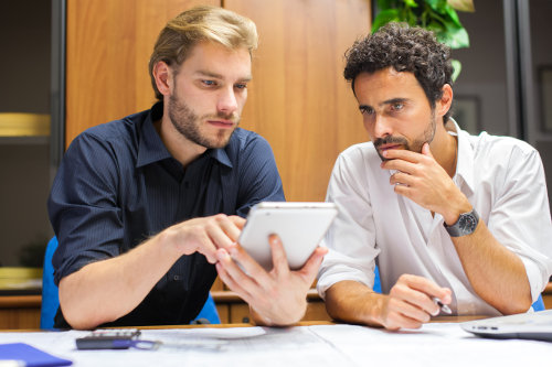 Business partners using HR sofware