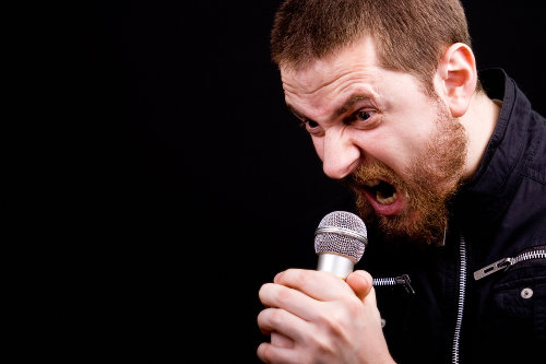 Screaming and angry rocker at corporate event