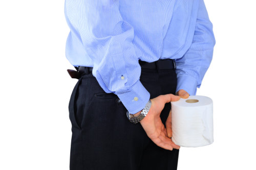 Office worker is stealing toilet paper from employer
