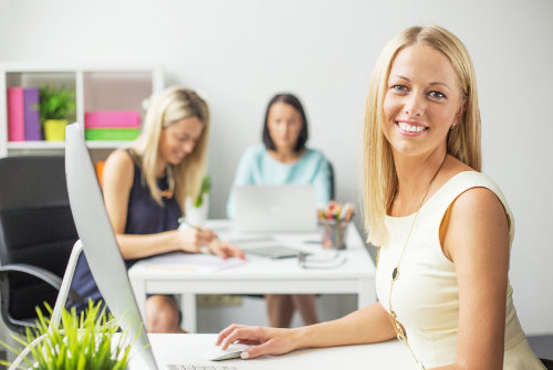 Happy employees in healthy office environment