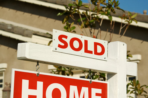 Sold home sign
