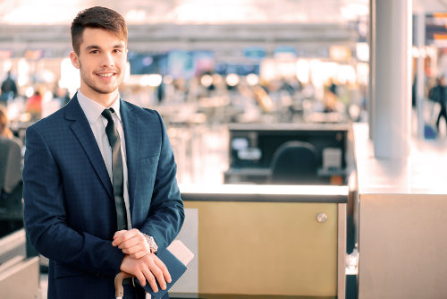 Business traveller holding passport