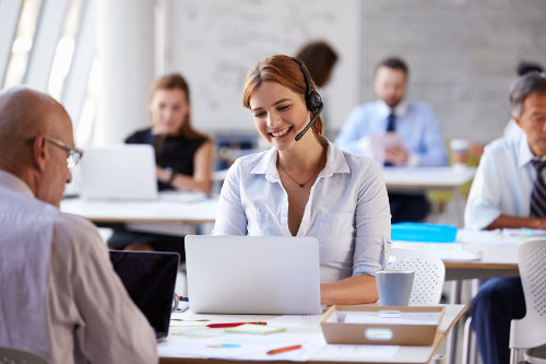 Businesswoman making VoIP call