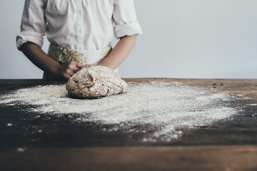 Chef wearing disposable apron