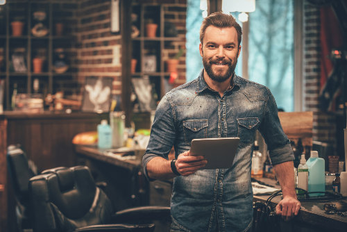 Barber shop owner doing digital marketing and advertising