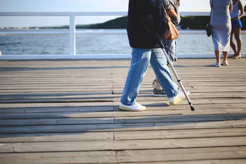 Injured employee on a crutch