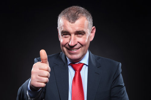 Happy boss giving a thumb up