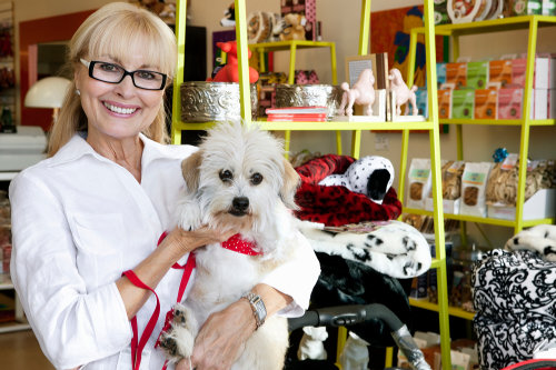 Happy pet shop owner