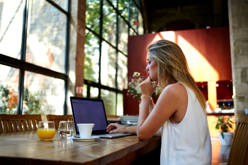 Businesswoman using business software