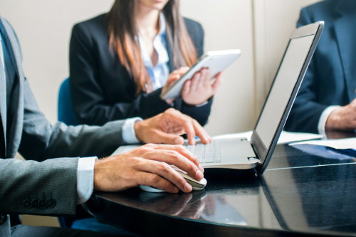 Businessman using contract management tools