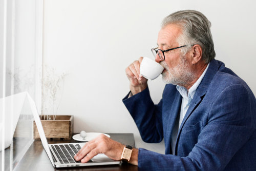 Businessman reading business blog