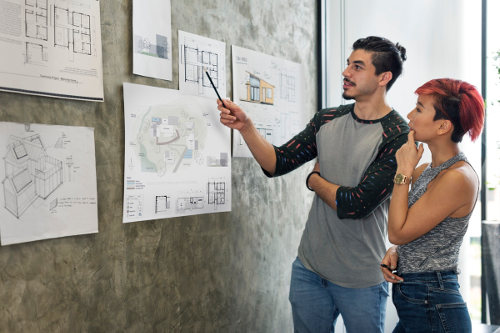 Architecture interns discussing