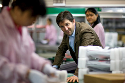 Entrepreneur managing factory