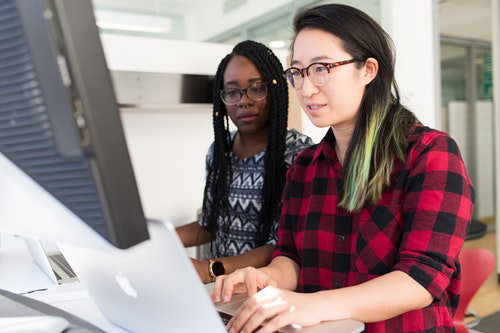 Business owners working with SAP ERP software