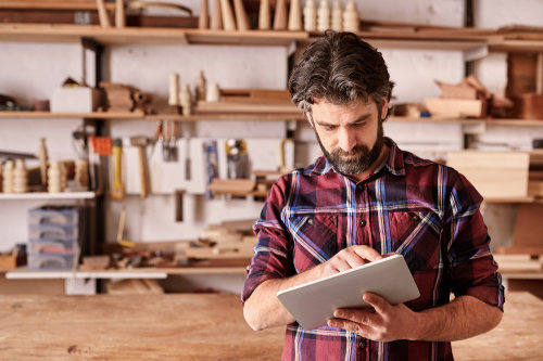 Business owner using automation software