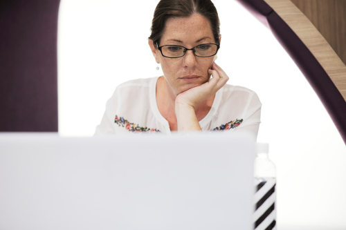 Businesswoman using uatomation tools