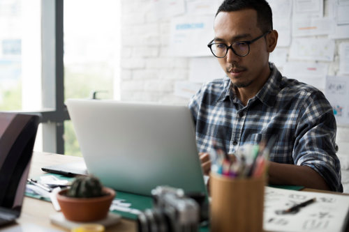Businessman using business software