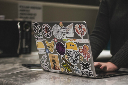 Custom stickers on laptop