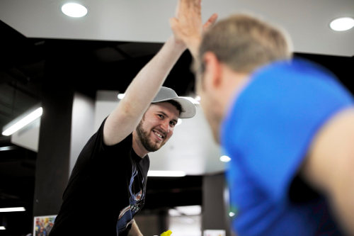 Startup small business owners high-fiving