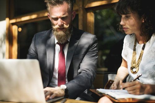 Business owners strategizing for success
