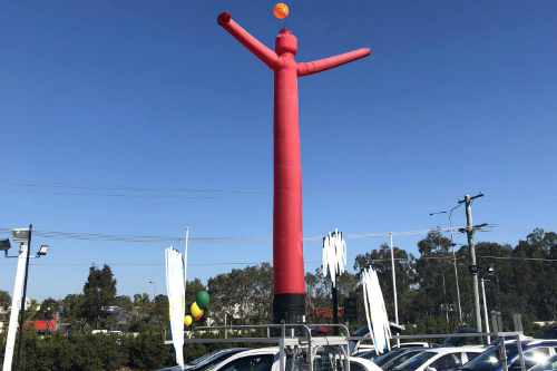 Dancing balloon on car lot