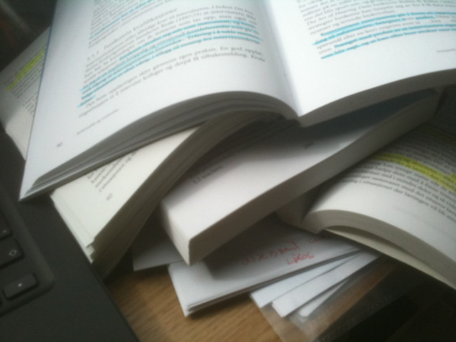 Stack of essays on teacher's desk