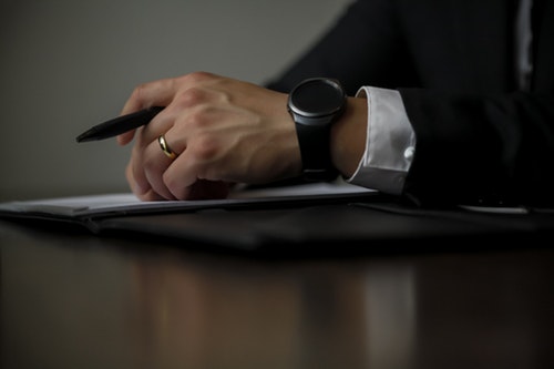 Attorney filing out real estate paperwork