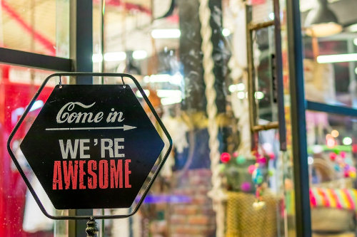 Unique retail store welcome sign