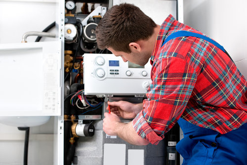 Professional plumber at work