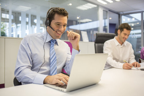 Marketer doing cold calling and social selling