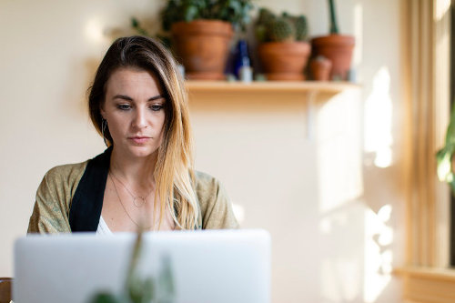 Businesswoman using productivity tools
