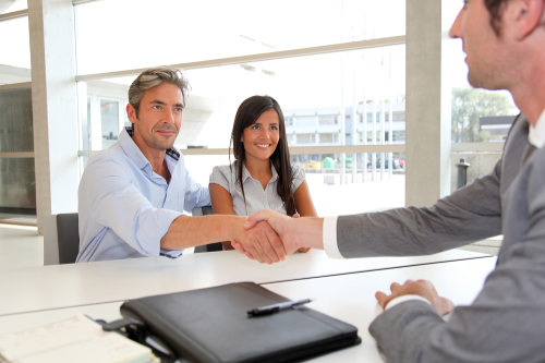 Property manager talking with clients