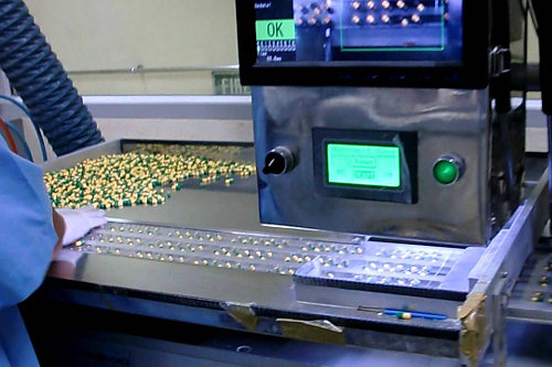 Machine vision system inspecting blister packs