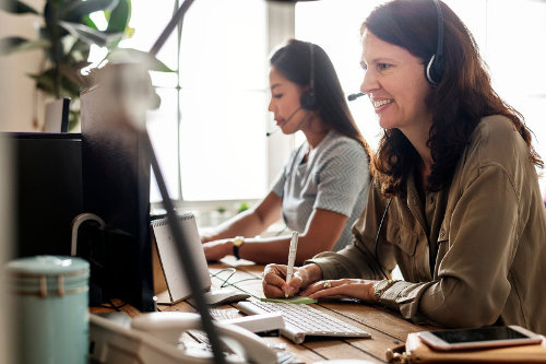 Business people using VoIP