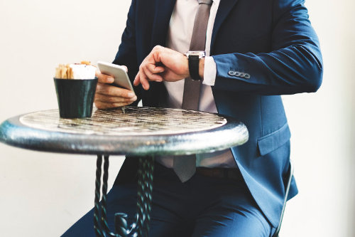 Businessman using reminder app