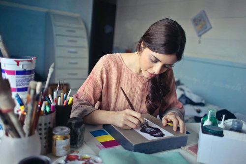 Artist creates painting
