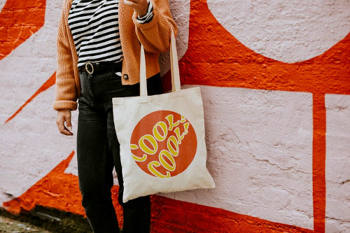 Woman with customized tote bags