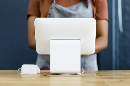 Small business owner and her POS system
