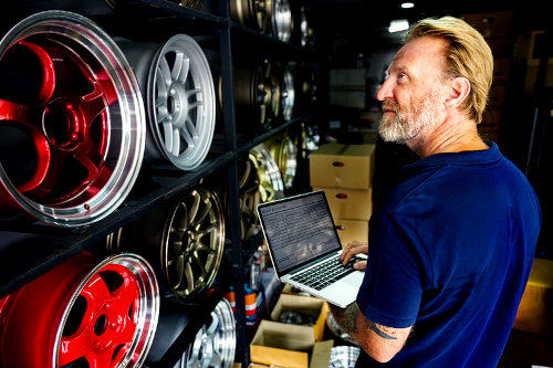Mechanic managing auto parts