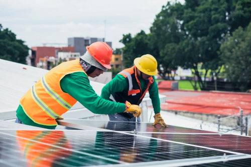 Field service crew installing solar panels