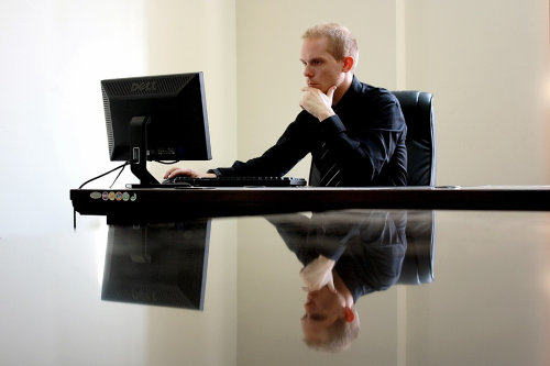 Businessman writing a business plan