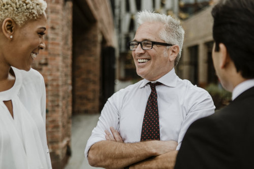CEO having a conversation with his employees 