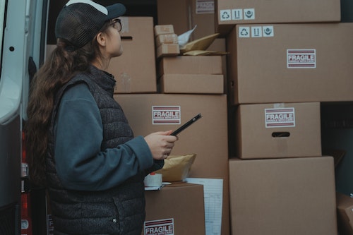 Checking the truck load against the necessary permit.